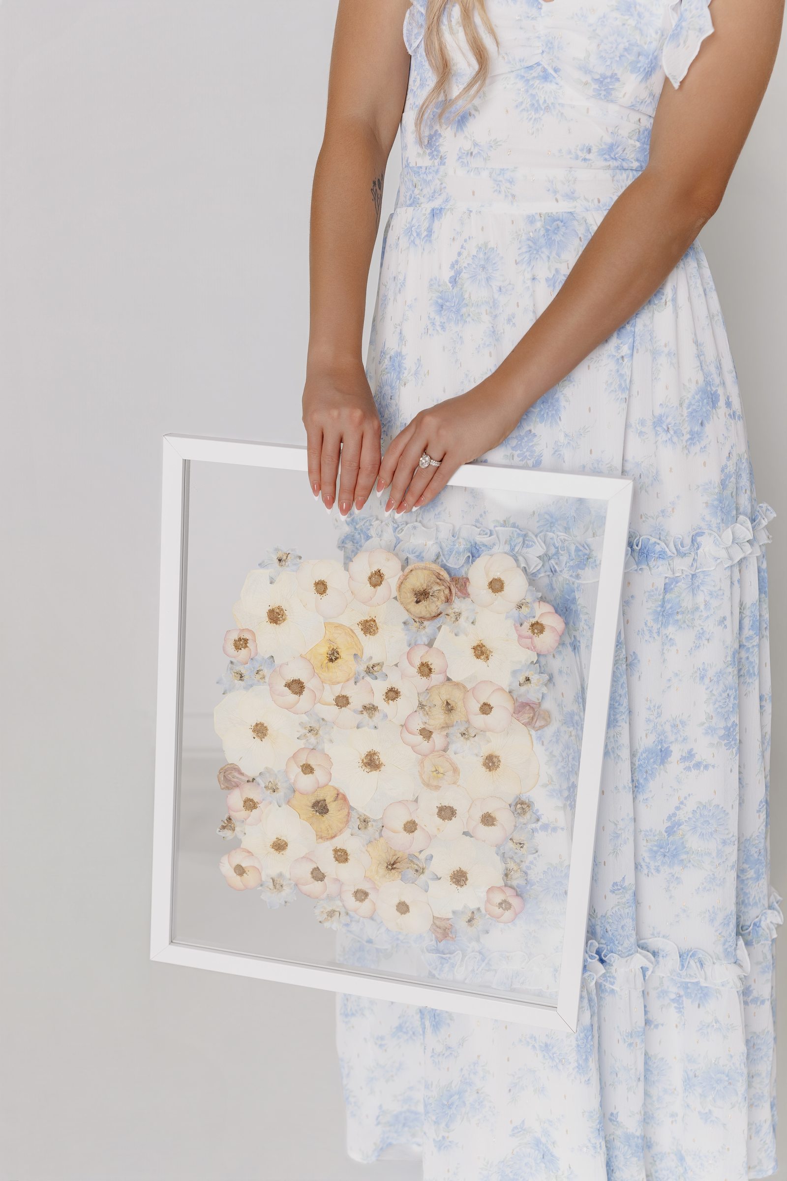 A framed pressed-flower keepsake