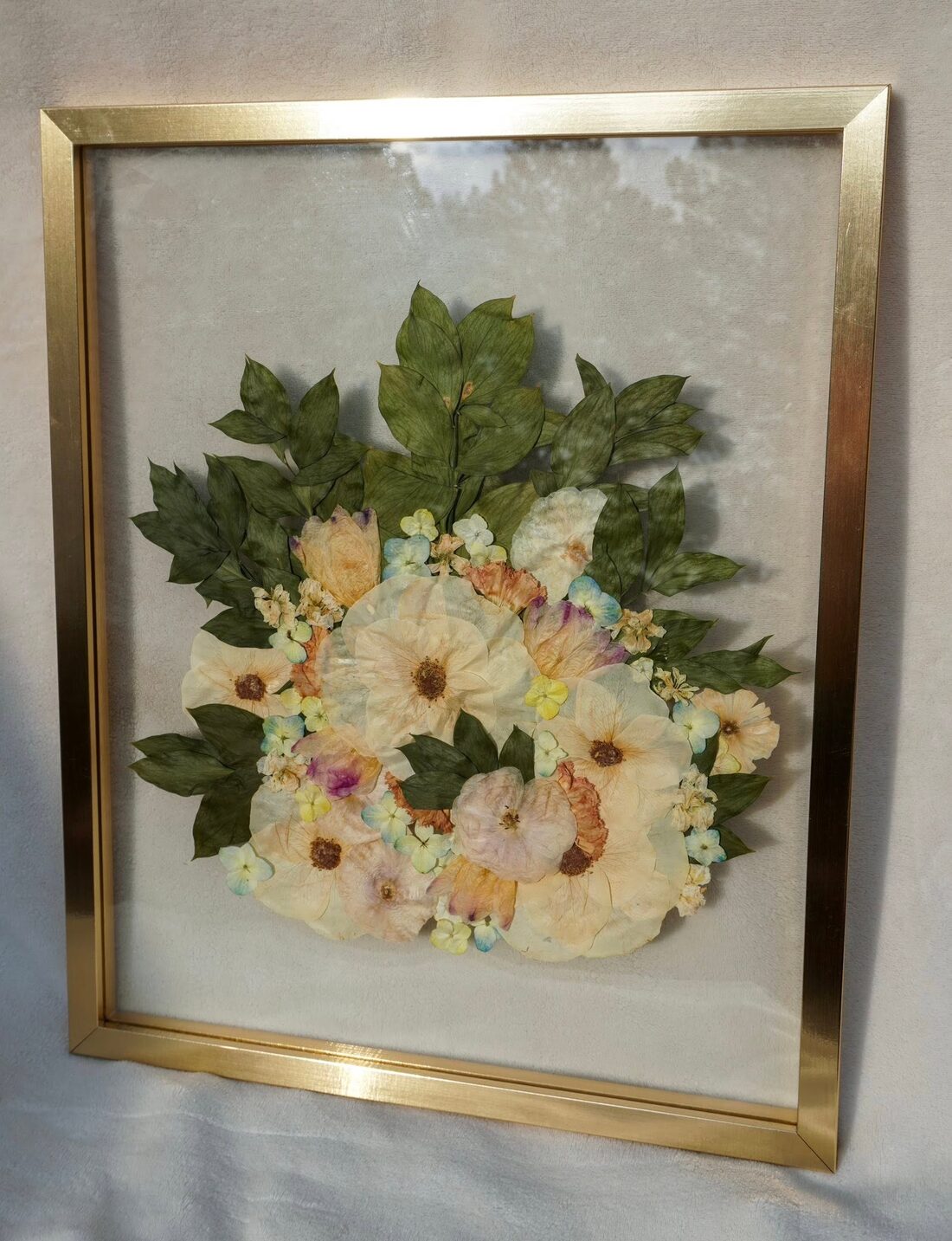 The same bouquet, pressed and framed