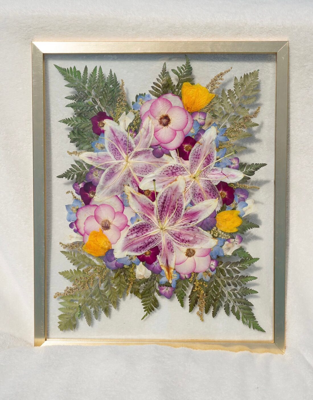 The same bouquet, pressed and framed